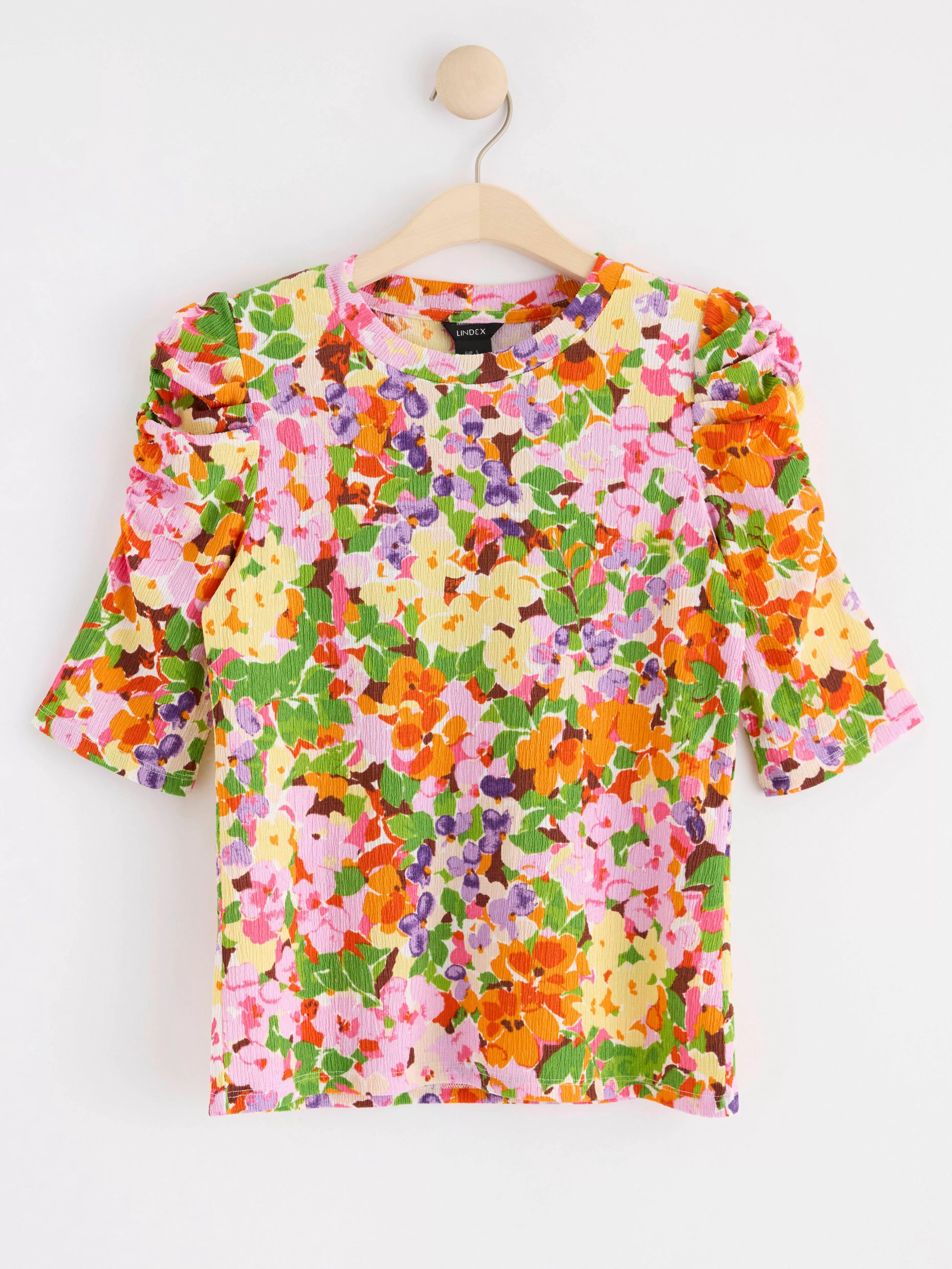 Dam Lindex Topp Med Puffarm Och Blommor
